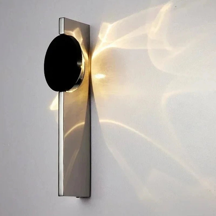 Ścienna lampa LED - obrotowa konstrukcja z podwójnym dyskiem